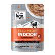 A package of cat food featuring the Feed Meow Indoor product label and a close-up of food on a plate.