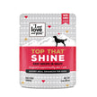 Dog food package with silhouette of a dog and love-powered punch.